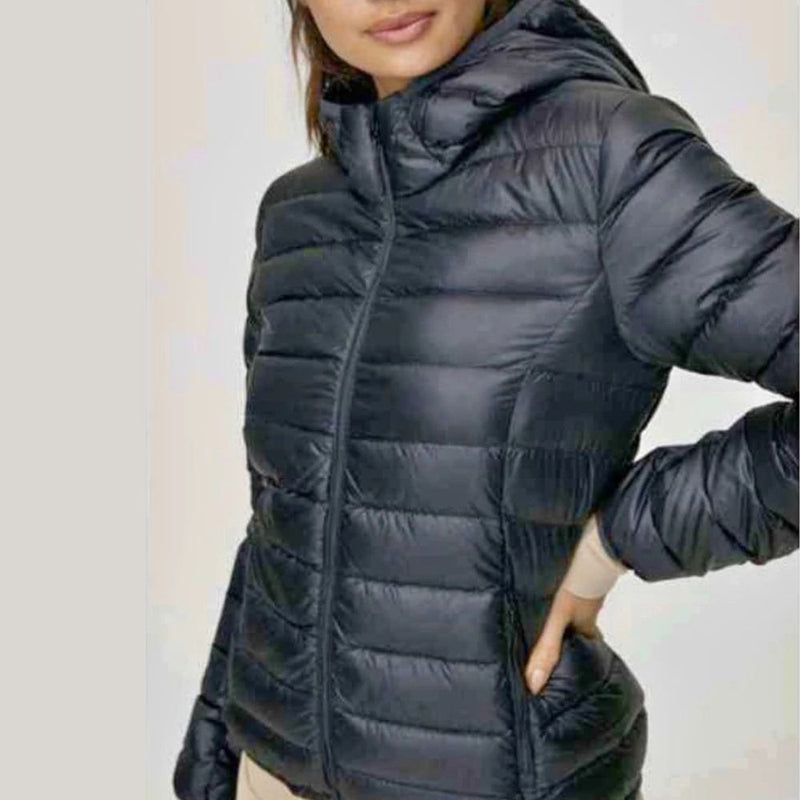 Jaqueta Puffer Feminina de Couro – Forrada e com capuz para estilo e proteção