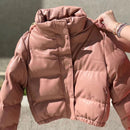 Jaqueta Puffer Feminina de Couro – Forrada e com capuz para estilo e proteção